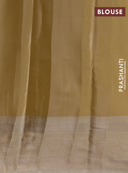 Semi kanchipuram tissue silk saree sandal with allover silver zari woven brocade weaves and zari woven border