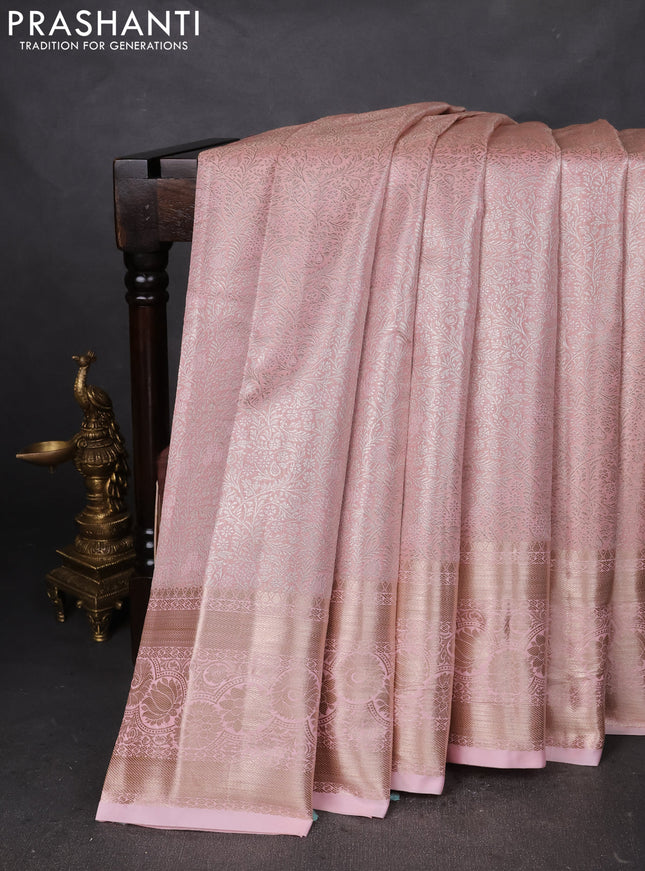 Semi kanchipuram tissue silk saree peach shade with allover silver zari woven brocade weaves and zari woven border