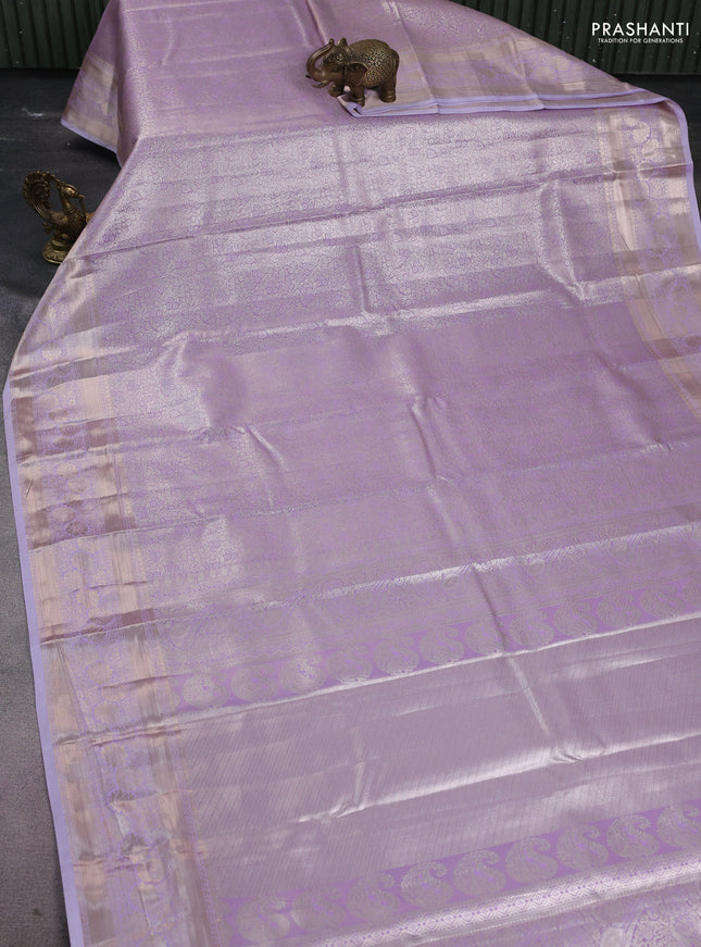 Semi kanchipuram tissue silk saree lavender with allover silver zari woven brocade weaves and zari woven border