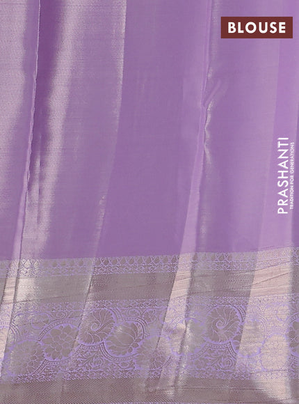 Semi kanchipuram tissue silk saree lavender with allover silver zari woven brocade weaves and zari woven border