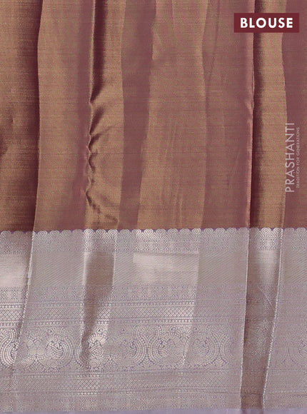 Semi kanchipuram tissue silk saree pastel pink with allover silver zari woven brocade weaves and long zari woven border