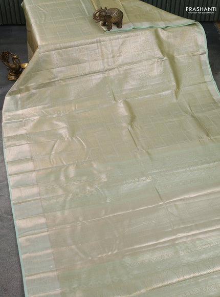Semi kanchipuram tissue silk saree pista green with allover silver zari woven brocade weaves and zari woven border