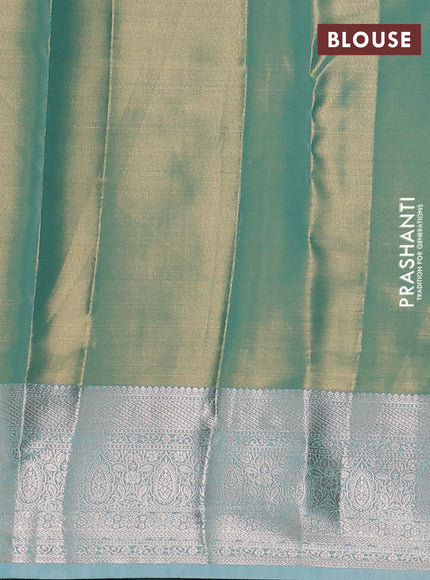 Semi kanchipuram tissue silk saree teal with allover silver zari woven brocade weaves and zari woven border