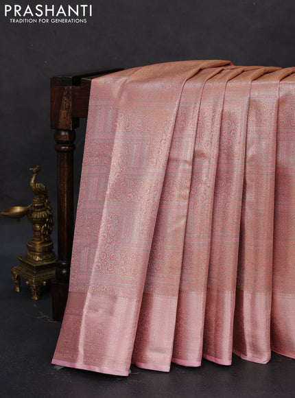 Semi kanchipuram tissue silk saree peach shade with allover silver zari woven brocade weaves and zari woven border