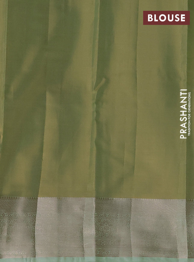 Semi kanchipuram tissue silk saree pista green with allover silver zari woven brocade weaves and zari woven border
