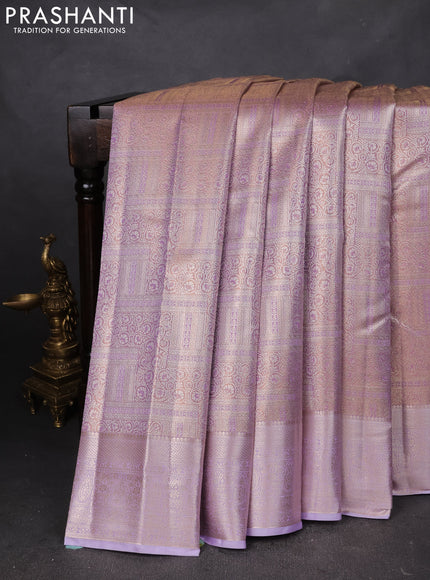 Semi kanchipuram tissue silk saree mild lavender and lavender with allover silver zari woven brocade weaves and zari woven border
