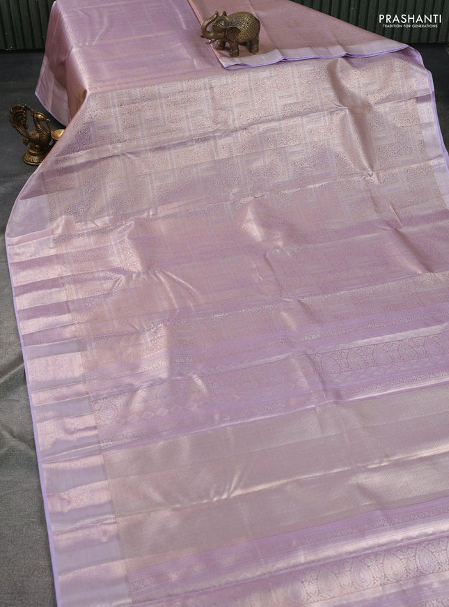 Semi kanchipuram tissue silk saree mild lavender and lavender with allover silver zari woven brocade weaves and zari woven border