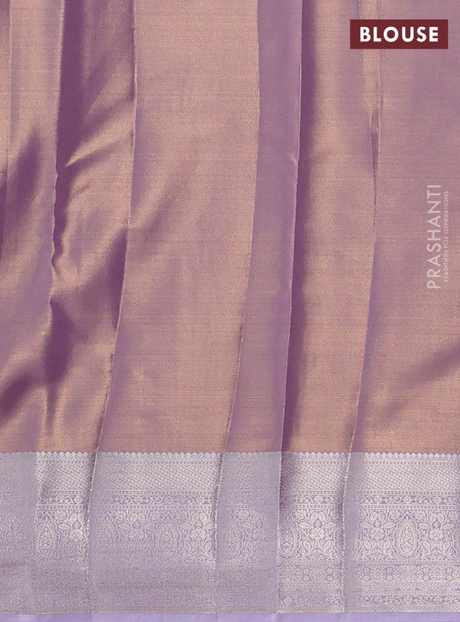 Semi kanchipuram tissue silk saree mild lavender and lavender with allover silver zari woven brocade weaves and zari woven border