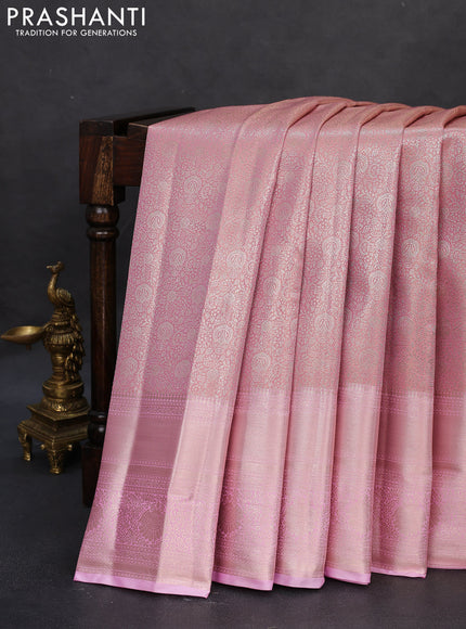 Semi kanchipuram tissue silk saree light pink with allover silver zari woven brocade weaves and long zari woven border
