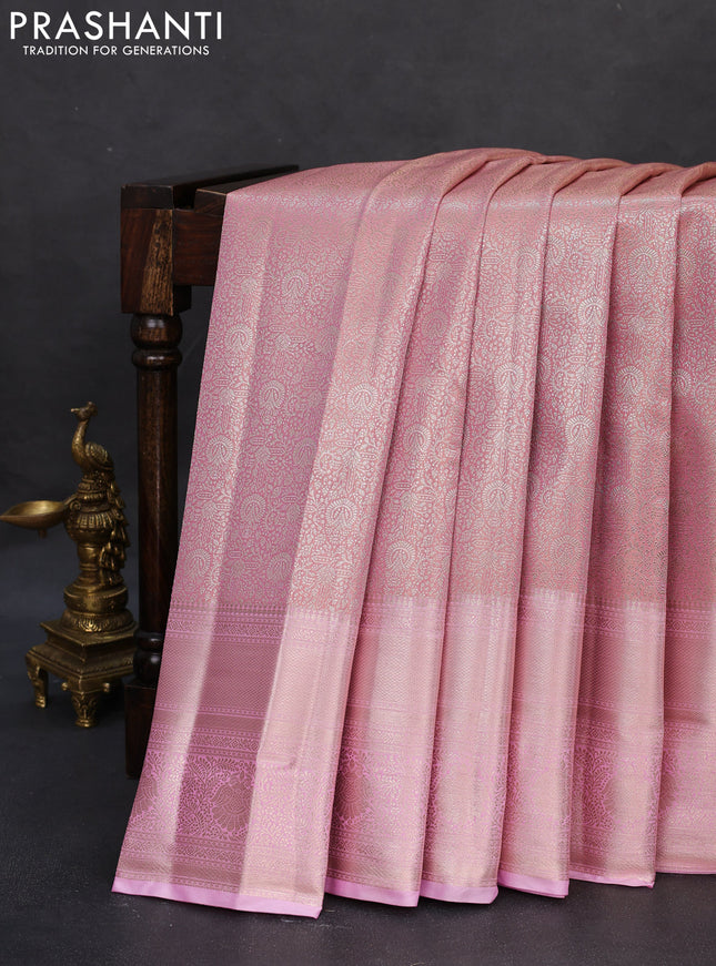 Semi kanchipuram tissue silk saree light pink with allover silver zari woven brocade weaves and long zari woven border