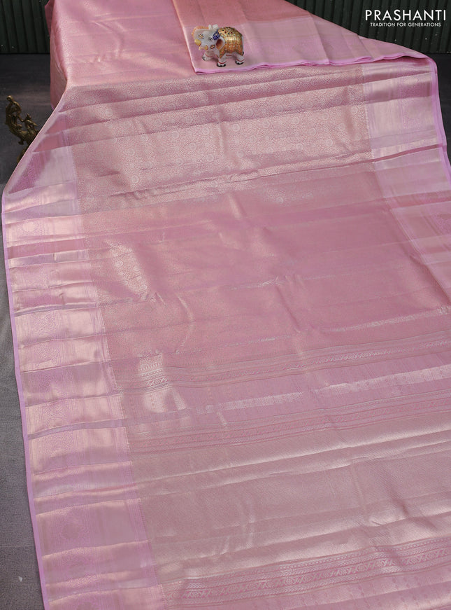 Semi kanchipuram tissue silk saree light pink with allover silver zari woven brocade weaves and long zari woven border