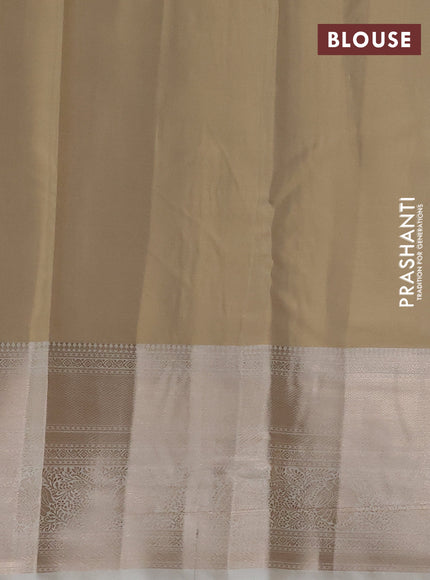 Semi kanchipuram tissue silk saree cream with allover silver zari woven brocade weaves and long zari woven border