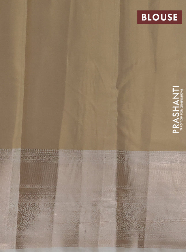 Semi kanchipuram tissue silk saree cream with allover silver zari woven brocade weaves and long zari woven border