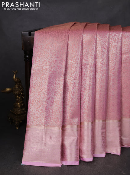 Semi kanchipuram tissue silk saree light pink with allover silver zari woven brocade weaves and zari woven border