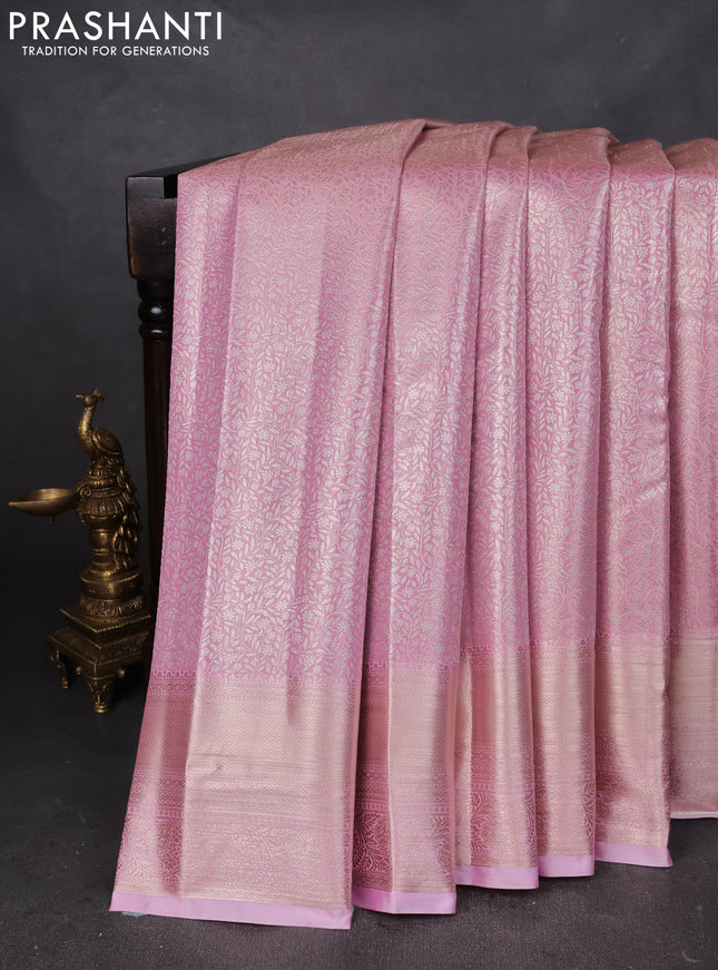 Semi kanchipuram tissue silk saree light pink with allover silver zari woven brocade weaves and zari woven border