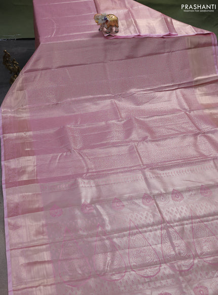 Semi kanchipuram tissue silk saree light pink with allover silver zari woven brocade weaves and zari woven border