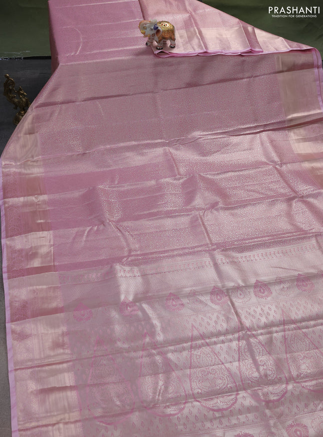 Semi kanchipuram tissue silk saree light pink with allover silver zari woven brocade weaves and zari woven border