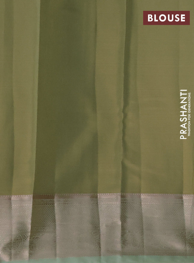 Semi kanchipuram tissue silk saree pista green with allover silver zari woven brocade weaves and zari woven border