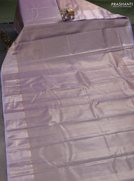 Semi kanchipuram tissue silk saree mild lavender with allover silver zari woven brocade weaves and zari woven border