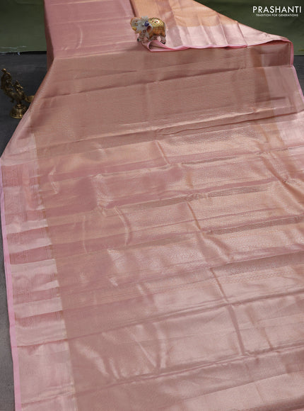 Semi kanchipuram tissue silk saree dual shade of peach and mild peach pink with allover silver zari woven brocade weaves and zari woven border