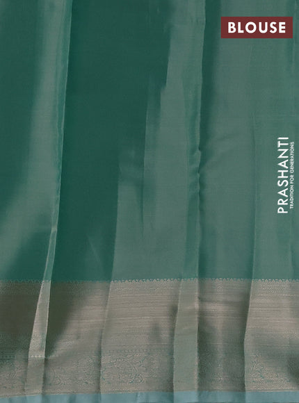 Semi kanchipuram tissue silk saree teal blue with allover silver zari woven brocade weaves and zari woven border