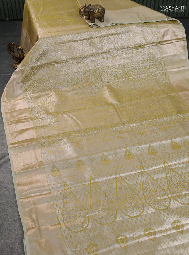 Semi kanchipuram tissue silk saree lime yellow with allover silver zari woven brocade weaves and zari woven border