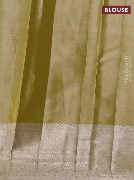Semi kanchipuram tissue silk saree lime yellow with allover silver zari woven brocade weaves and zari woven border