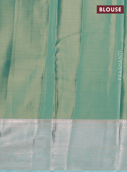 Semi kanchipuram tissue silk saree teal blue with allover silver zari woven brocade weaves and zari woven border