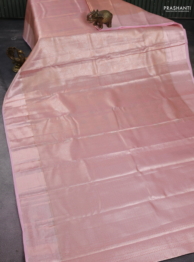Semi kanchipuram tissue silk saree peach orange and peach pink with allover silver zari woven brocade weaves and zari woven border