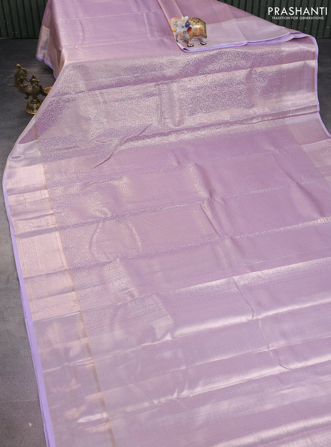 Semi kanchipuram tissue silk saree lavender with allover silver zari woven brocade weaves and zari woven border
