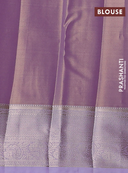 Semi kanchipuram tissue silk saree mild lavender with allover silver zari woven brocade weaves and zari woven border