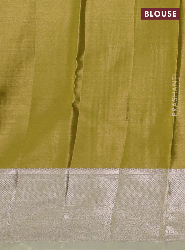 Semi kanchipuram tissue silk saree lime yellow with allover silver zari woven brocade weaves and zari woven border