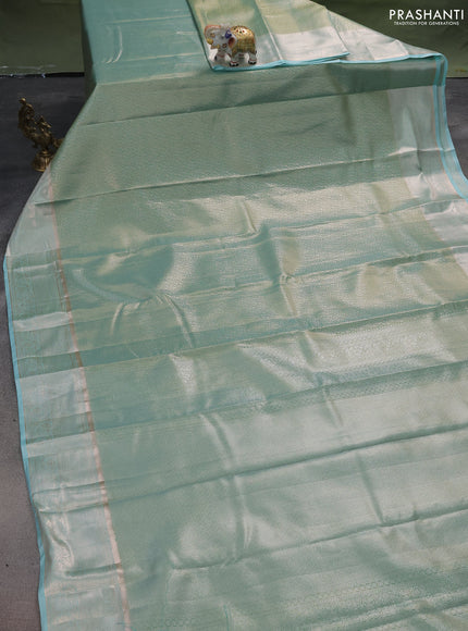 Semi kanchipuram tissue silk saree teal with allover silver zari woven brocade weaves and zari woven border