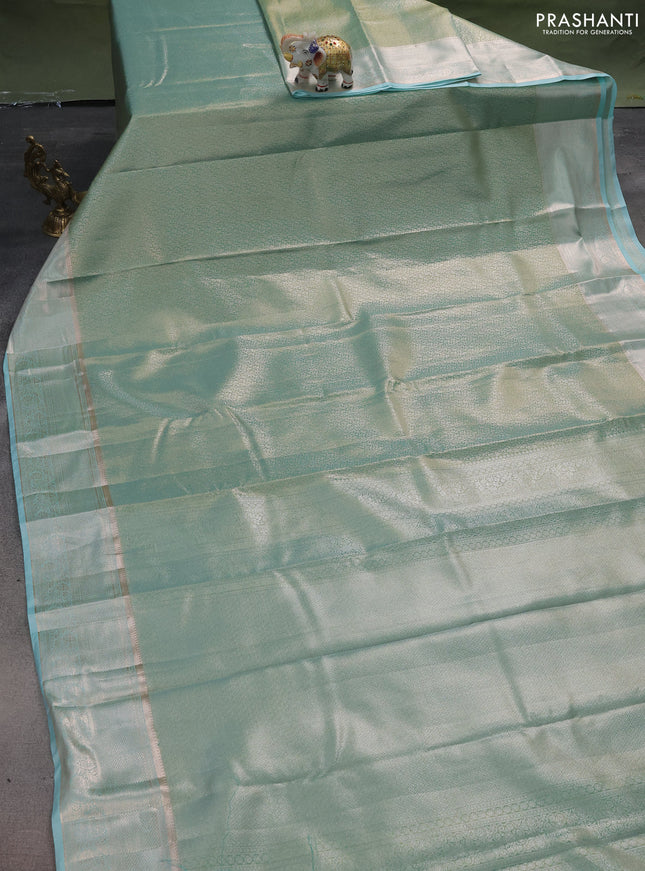 Semi kanchipuram tissue silk saree teal with allover silver zari woven brocade weaves and zari woven border