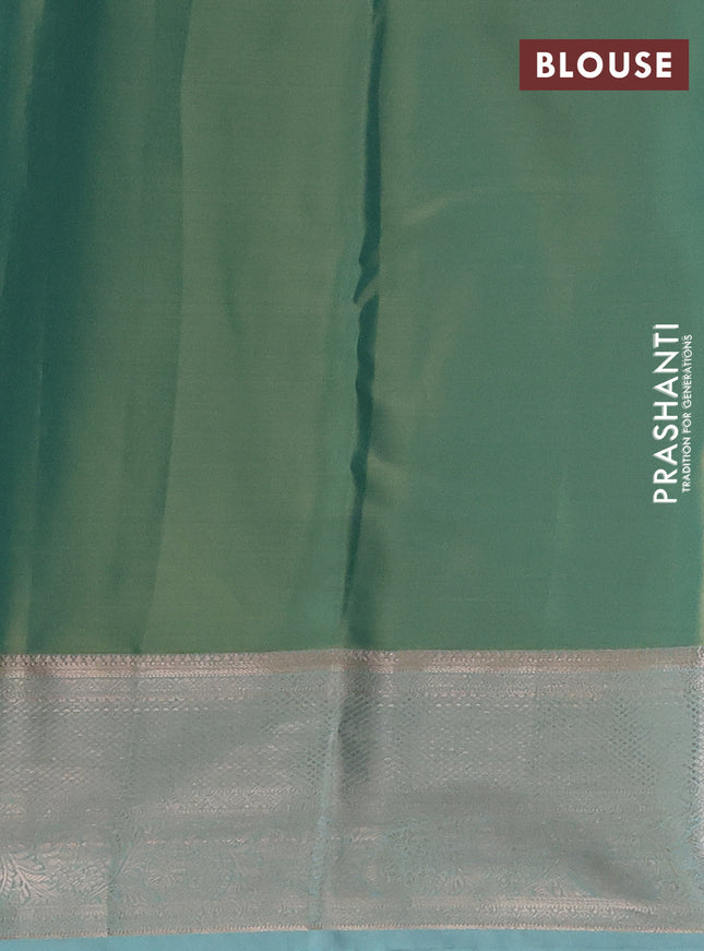 Semi kanchipuram tissue silk saree teal with allover silver zari woven brocade weaves and zari woven border
