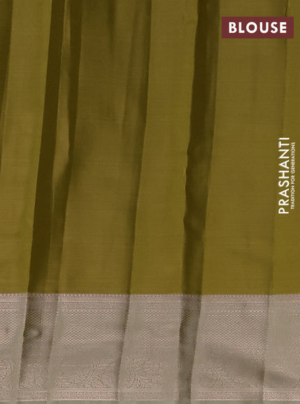 Semi kanchipuram tissue silk saree lime green with allover silver zari woven brocade weaves and zari woven border