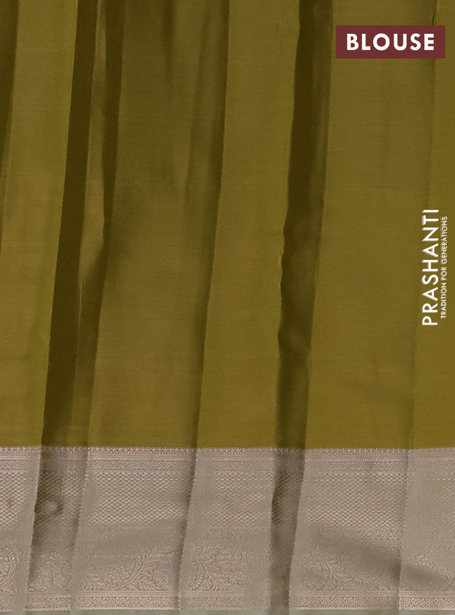 Semi kanchipuram tissue silk saree lime green with allover silver zari woven brocade weaves and zari woven border