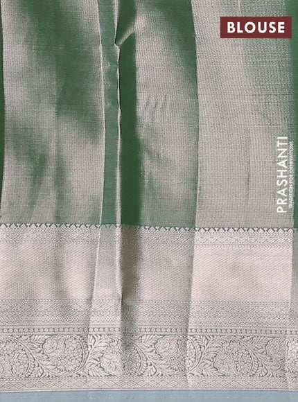 Semi kanchipuram tissue silk saree green shade with allover silver zari woven brocade weaves and zari woven border