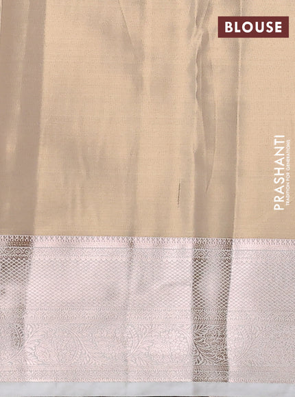 Semi kanchipuram tissue silk saree cream with allover silver zari woven brocade weaves and zari woven border