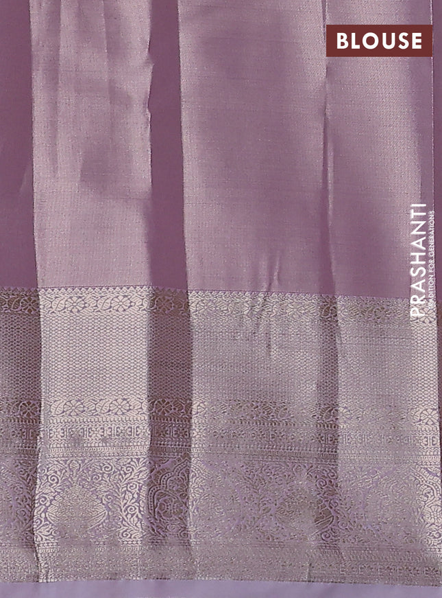 Semi kanchipuram tissue silk saree mild lavender with allover silver zari woven brocade weaves and long zari woven border