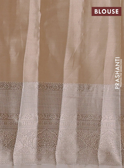 Semi kanchipuram tissue silk saree sandal with allover silver zari woven brocade weaves and long zari woven border