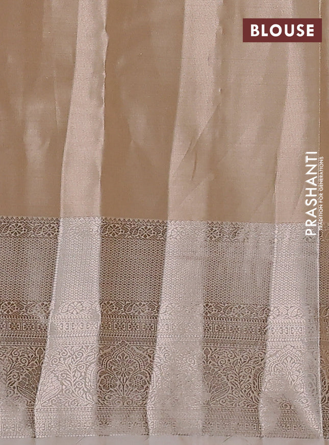 Semi kanchipuram tissue silk saree sandal with allover silver zari woven brocade weaves and long zari woven border