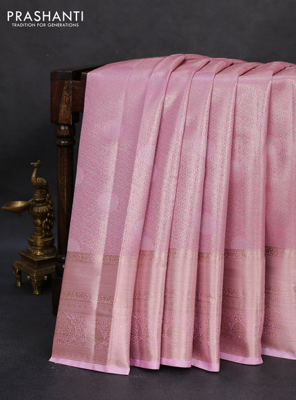 Semi kanchipuram tissue silk saree light pink with allover silver zari woven brocade weaves and long zari woven border