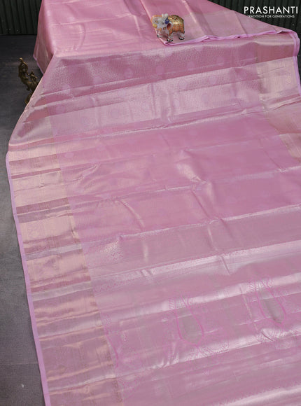 Semi kanchipuram tissue silk saree light pink with allover silver zari woven brocade weaves and long zari woven border