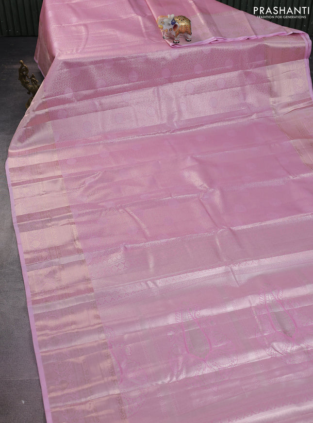 Semi kanchipuram tissue silk saree light pink with allover silver zari woven brocade weaves and long zari woven border