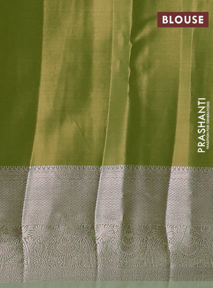 Semi kanchipuram tissue silk saree pista green with allover silver zari woven brocade weaves and zari woven border