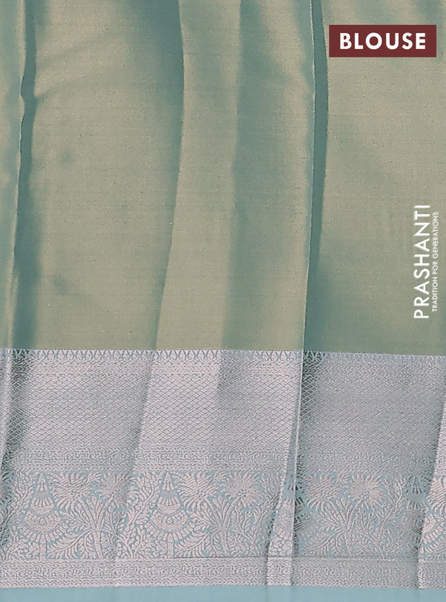 Semi kanchipuram tissue silk saree teal with allover silver zari woven brocade weaves and zari woven border