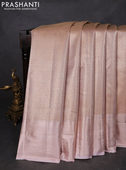 Semi kanchipuram tissue silk saree pastel peach with allover silver zari woven brocade weaves and zari woven border