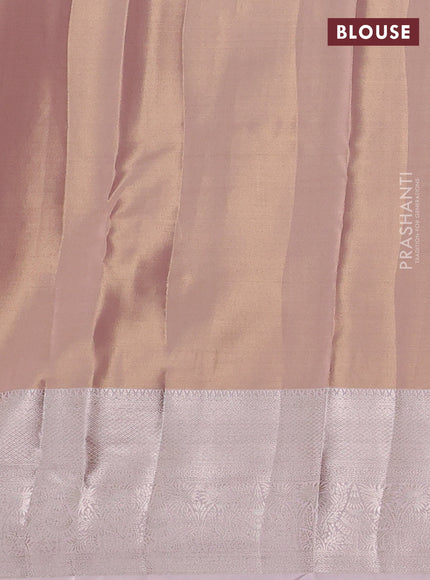 Semi kanchipuram tissue silk saree pastel peach with allover silver zari woven brocade weaves and zari woven border