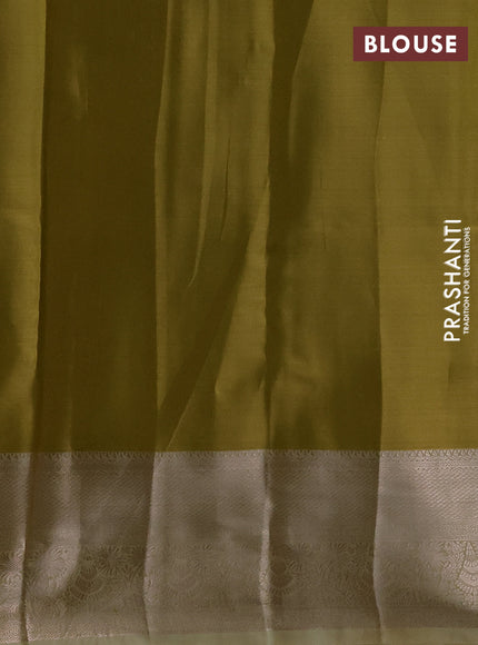 Semi kanchipuram tissue silk saree lime green and elaichi green with allover silver zari woven brocade weaves and zari woven border